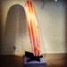 redwood and ash surfboard and stand