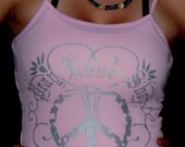 Pink  tank top with saying pray love shop and peace sign