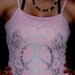 Pink  tank top with saying pray love shop and peace sign