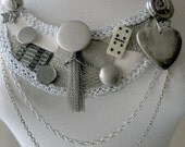Charms and Symbols Bib Necklace by MaggieGlynn