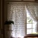 pair of romantic snow white ruffled curtains