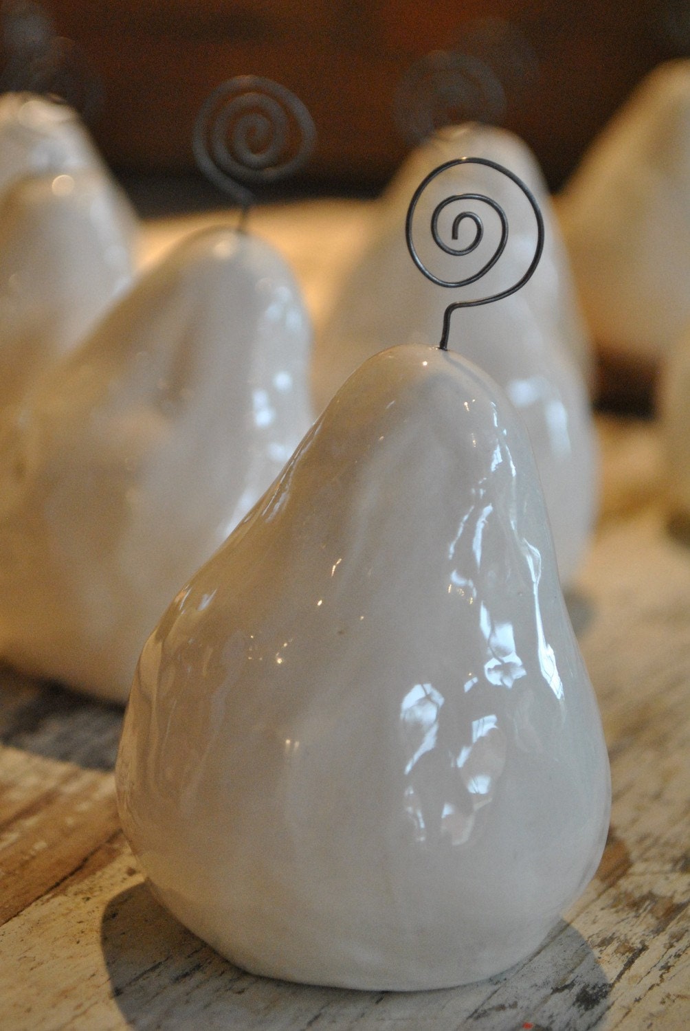 White ceramic pear place card, photo or business card holder