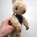 mohair rabbit with deep blue sweater
