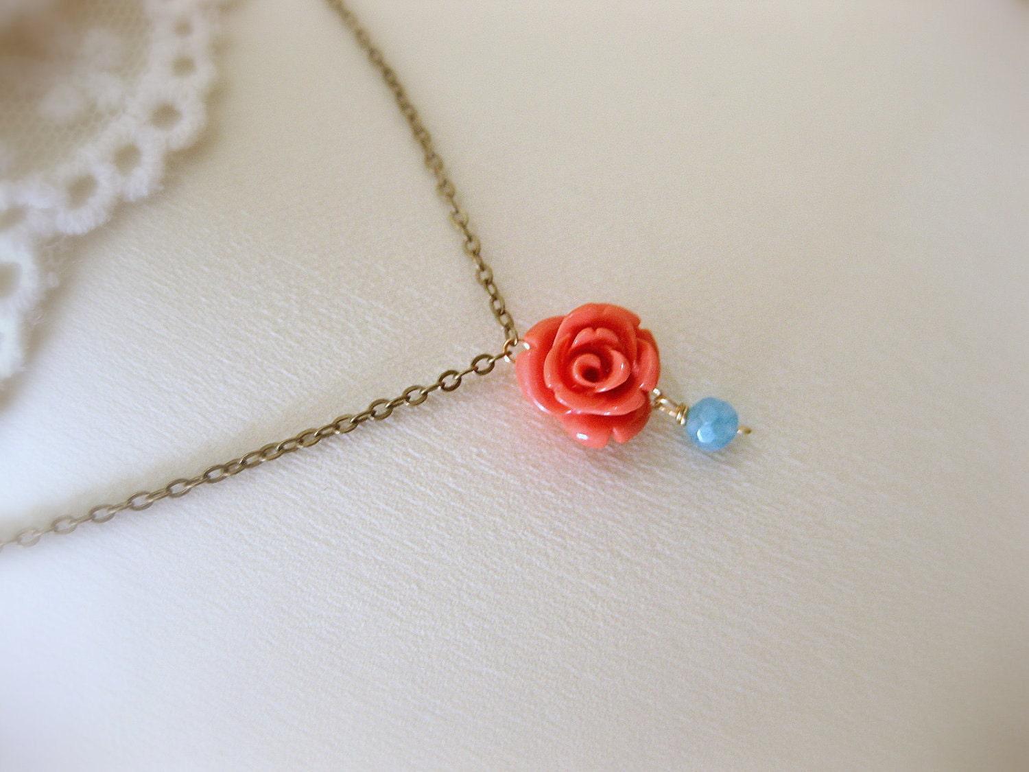 Coral reef. Carved rose with blue chalcedony necklace.