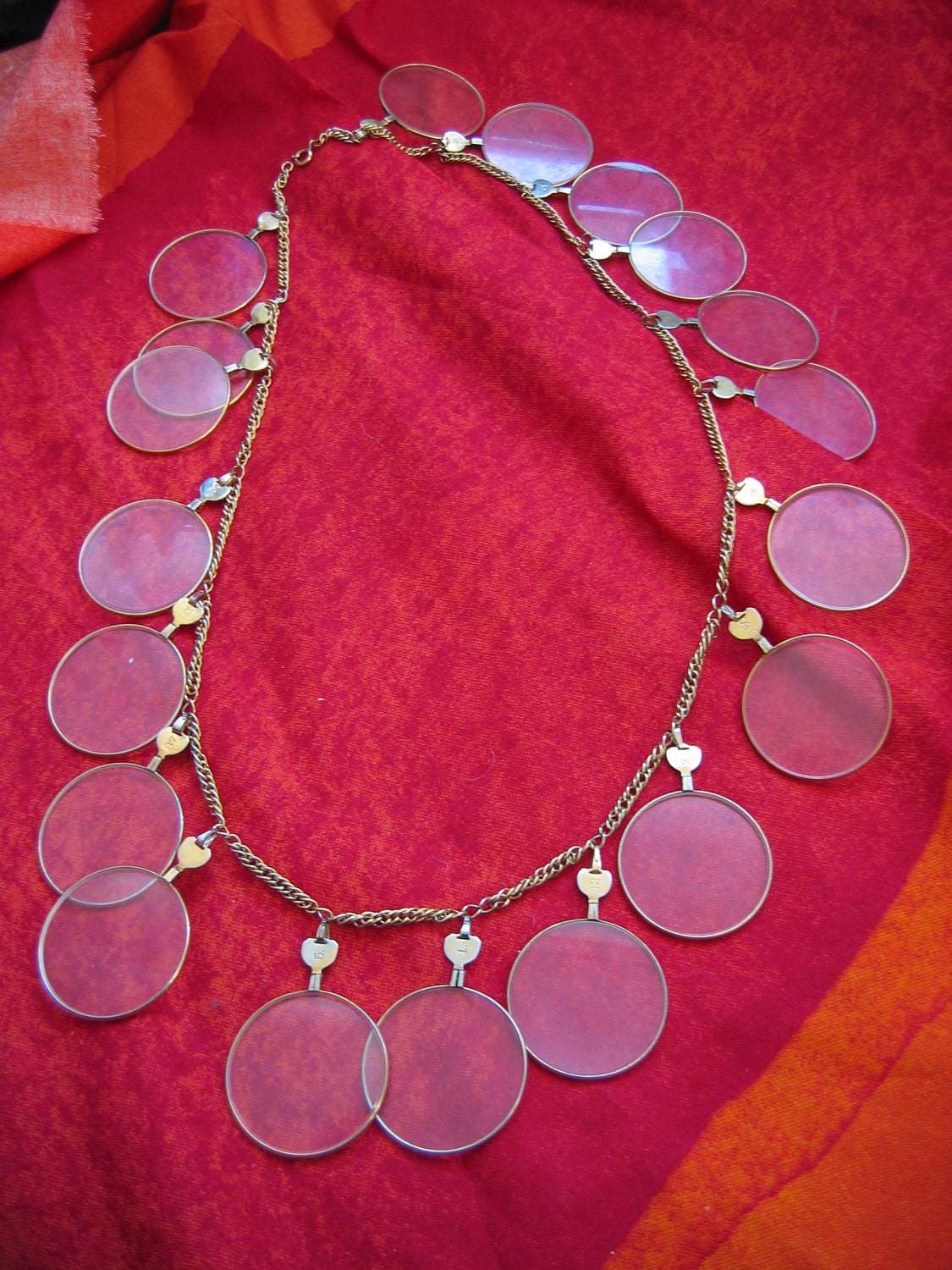 Vintage 1960's,  Optical Lens Necklace.  Gold plated with 19 antique lenses.  Decades before Steampunk.