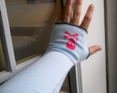 Hand Dyed skull and crossbones arm warmers in light turquoise or custom colors.