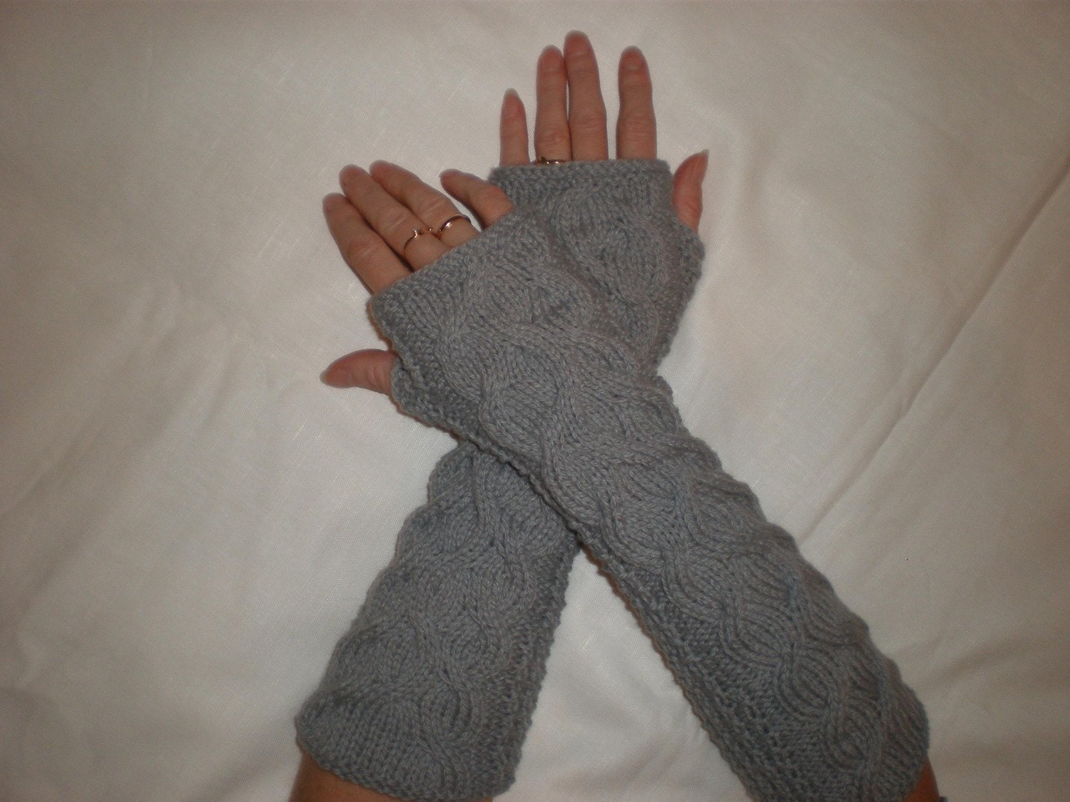 Hand-knitted women light grey wrist warmers with cables (extra long)