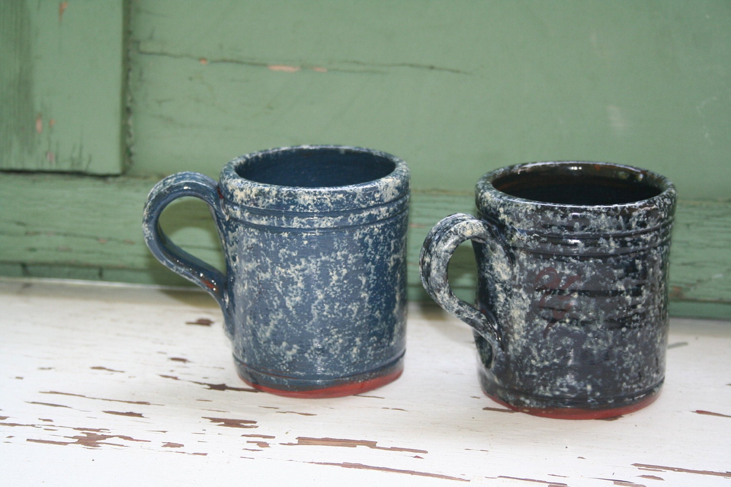 pair of coffee mugs - cups FOLTZ POTTERY 1980's handmade SPONGEWARE country blue