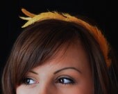 Farrah, a feather headband full of whimsy