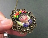 Frida Kahlo portrait, OOAK polymer clay pendant