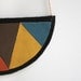 Leather necklace in half moon shape with triangle pattern - multicolored & black
