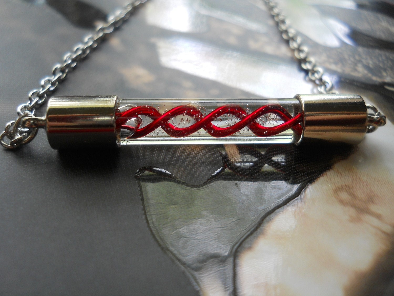 Handblown Glass Resident Evil Red G Virus Capsule Shield Necklace