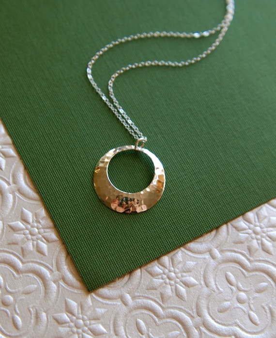 Sterling silver hammered disc pendant necklace