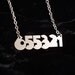 655321 Clockwork Orange Alex inspired necklace in silver stainless steel - unisex cult film geekery