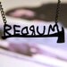 REDRUM text necklace with axe inspired by The Shining in black stainless steel