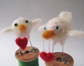 Cupid, needle felted bird fiber sculpture with heart