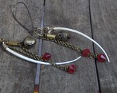 The Rattler. Snake rib bone, red crystal-ite and Rustic brass Gypsy bell earrings.