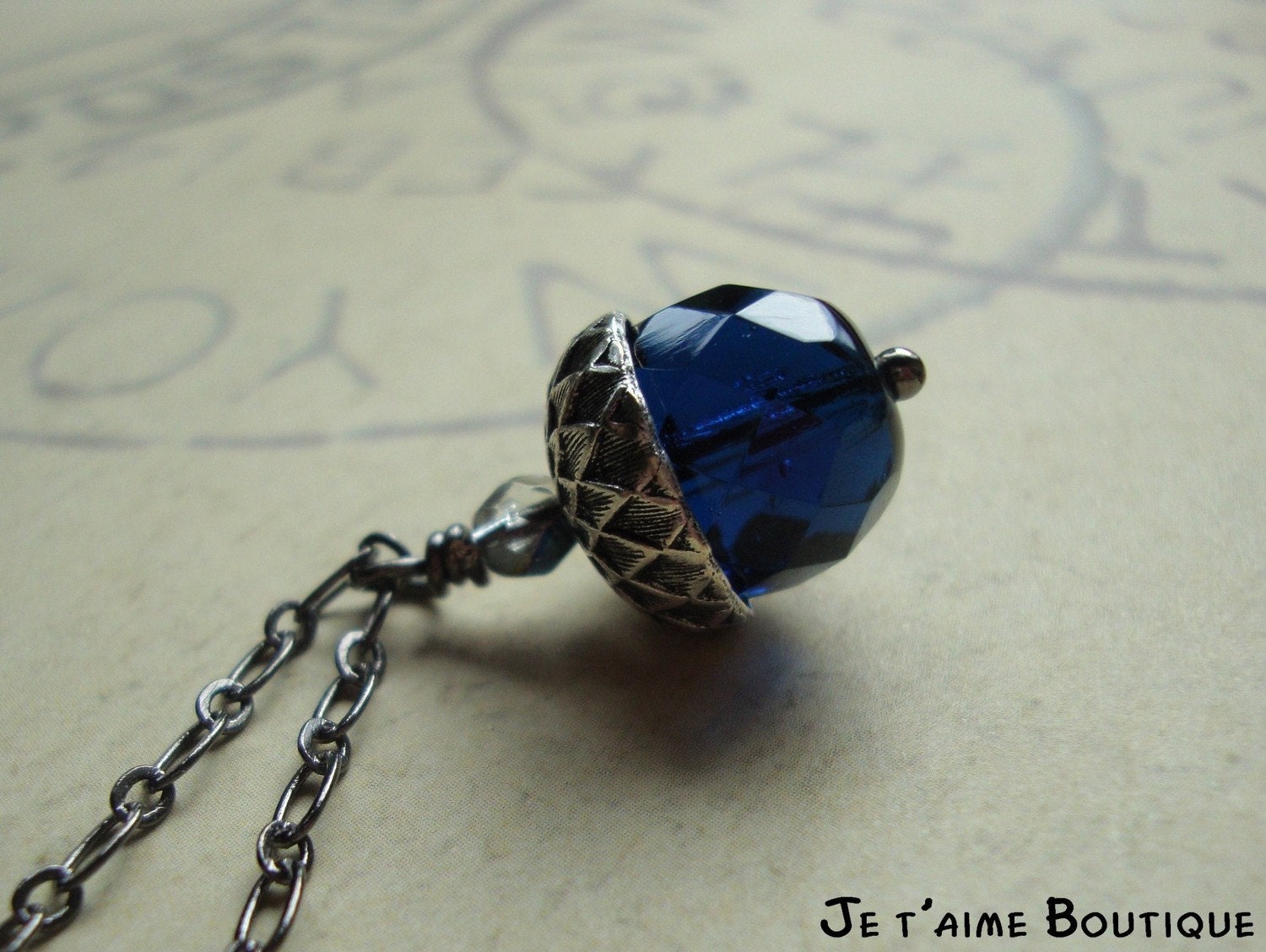 LE BLEU - Acorn Necklace in antiqued silver with faceted blue czech glass,  gunmetal and swarovski crystal