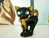 vintage Black Cat Shaker with Diamond Eyes and a Gold Bow