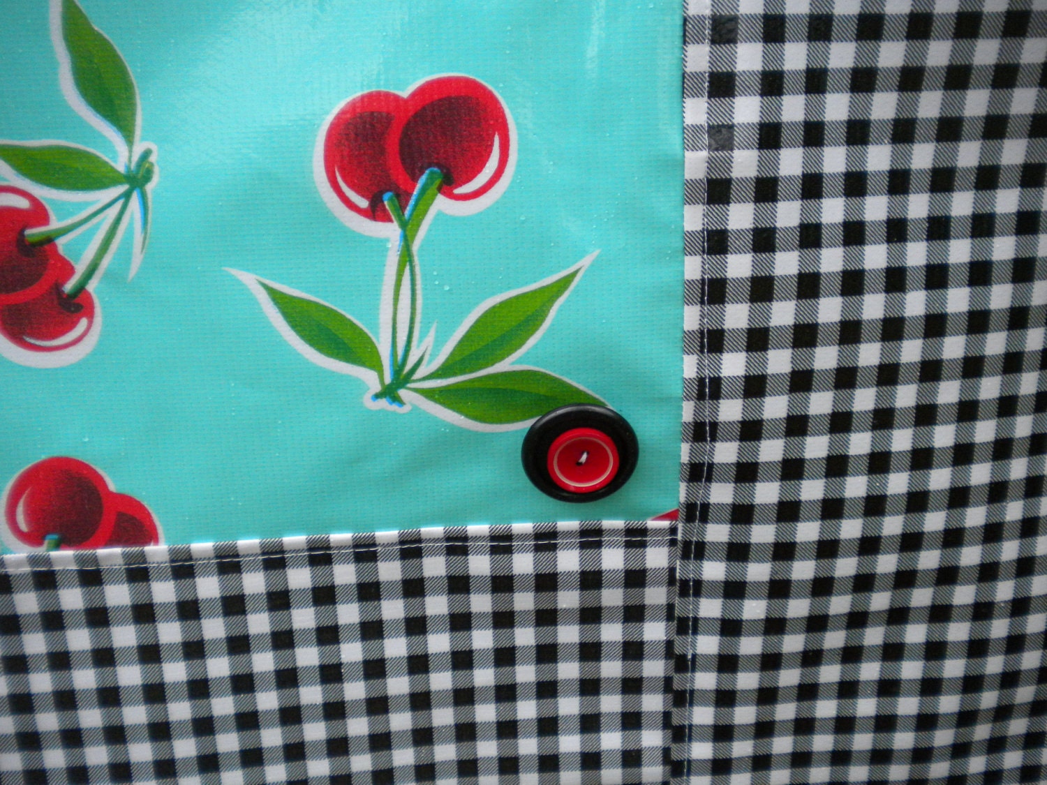 Retro oilcloth tablecloth with cherries and gingham