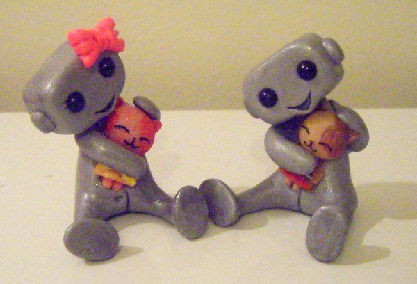 Robot Couple and their pet Kittens