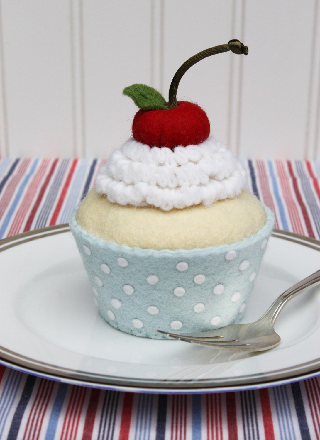 Felt Cupcake With White Whipped Cream, Cherry And Blue Liner