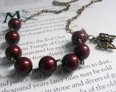 Burgundy Swarovski Pearl Necklace Hand Wrapped on Brass With Butterfly Charm