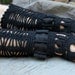 Luxurious, black gauntlets of silky merino wool
