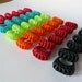 Multi coloured Polyoptic fruit ring - 3D printed in nylon