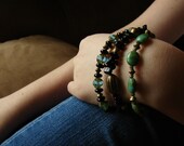 black onyx,"le fleur" bracelet with green glass and vintaj beads