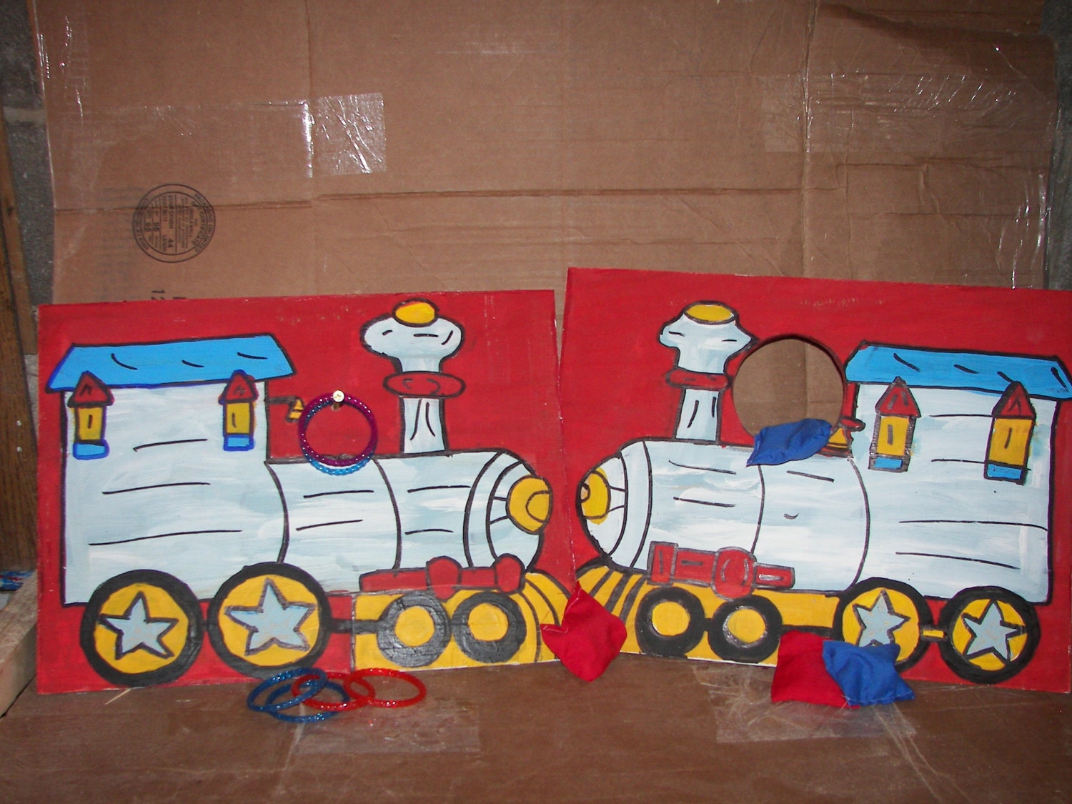 Train  Corn hole  game set of 2   with 6 rings and 4 bean bags