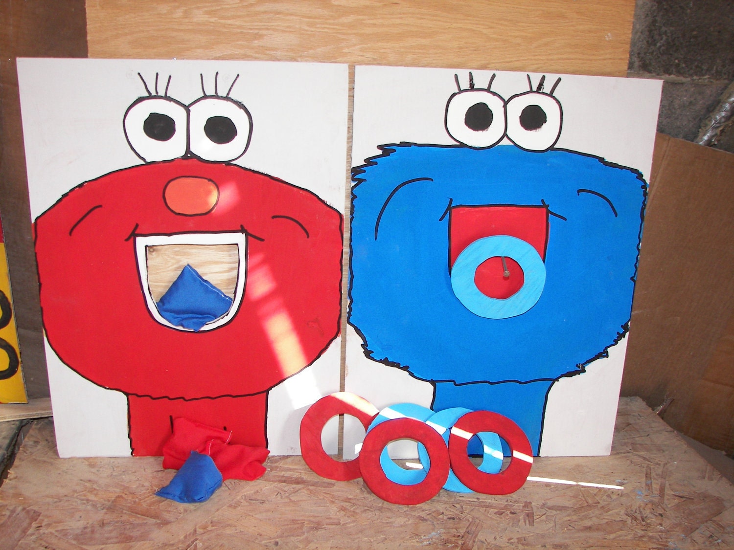 Elmo and cookie monster bean and ring toss