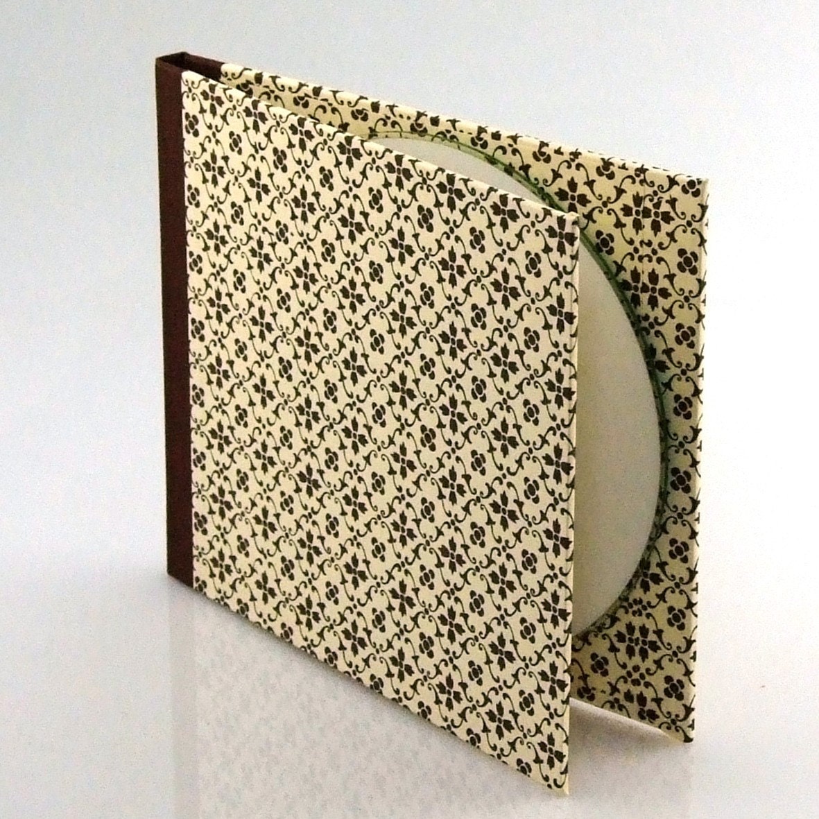Nauli CD-Case graphic star brown