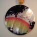 Whimsycle Capiz Shell Medallion Red And Gold Necklace with Child Blowing Bubbles