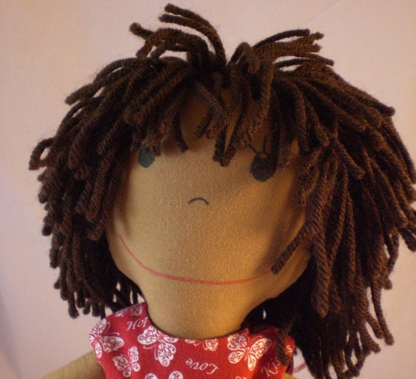 Rag Doll, medium skin tone and a mop of brown hair - Red Dress with Butterflies