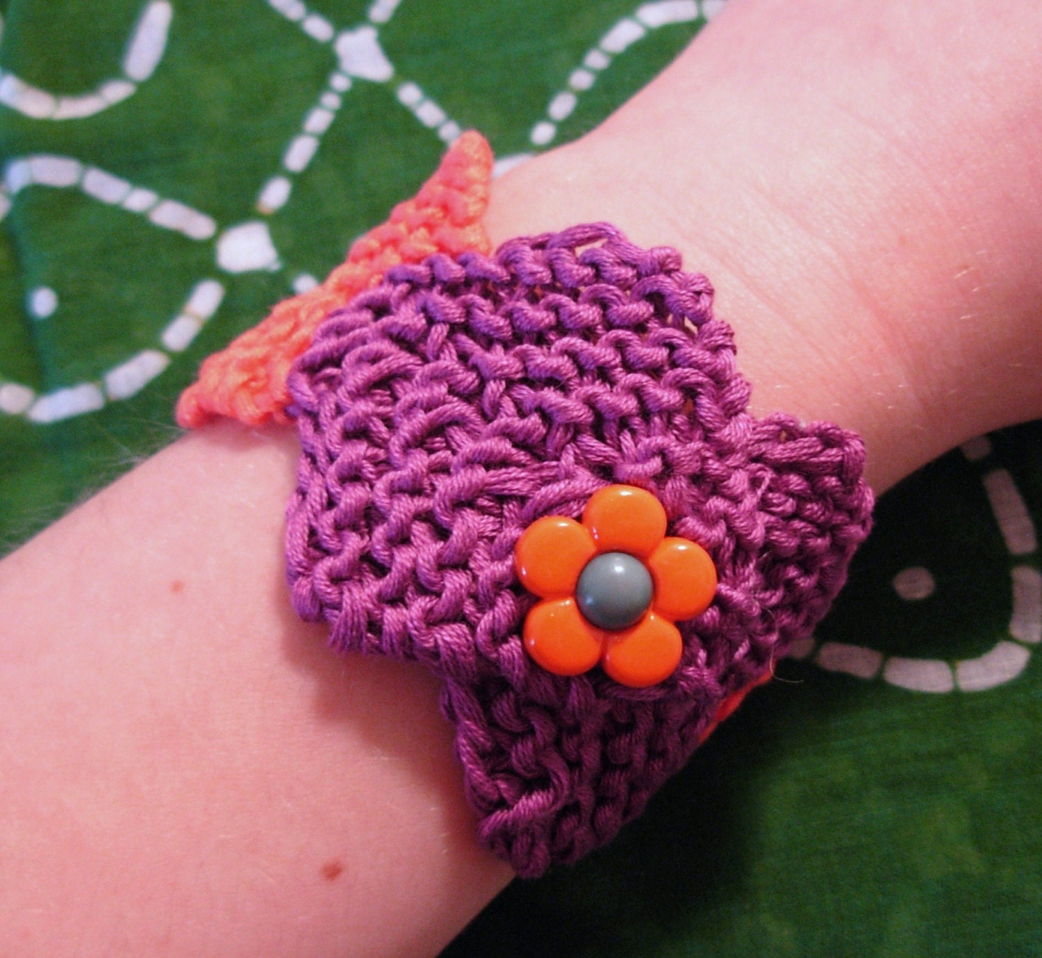 Purple and orange knitted cuff bracelet