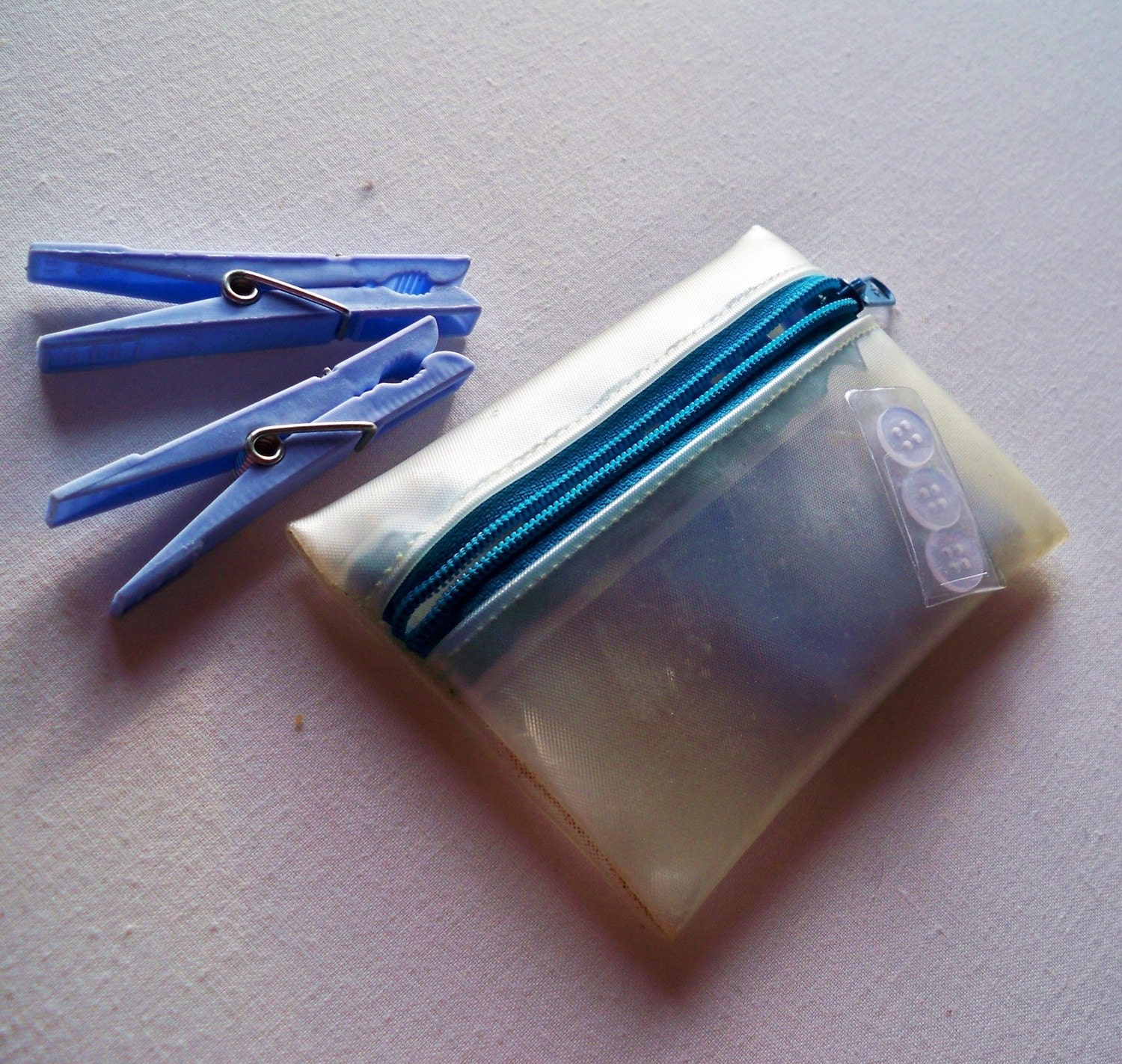 Vintage Travel Pouch containing Turquoise Pegs and Buttons -