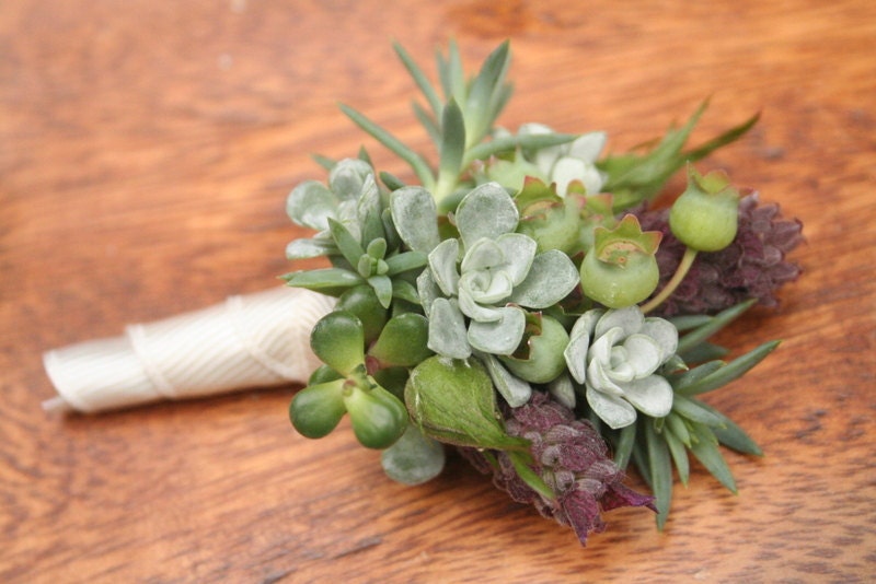 Boutonnieres, succulents, blueberries, lavender, natural elements.