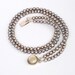 Double strand silver pearl choker with Sterling bezel pearl clasp
