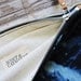 THE CONSTELLATION leather and canvas clutch