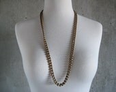 VINTAGE necklace goldtone oval beads long excellent condition
