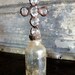 Set of 3 vintage bottles with crosses