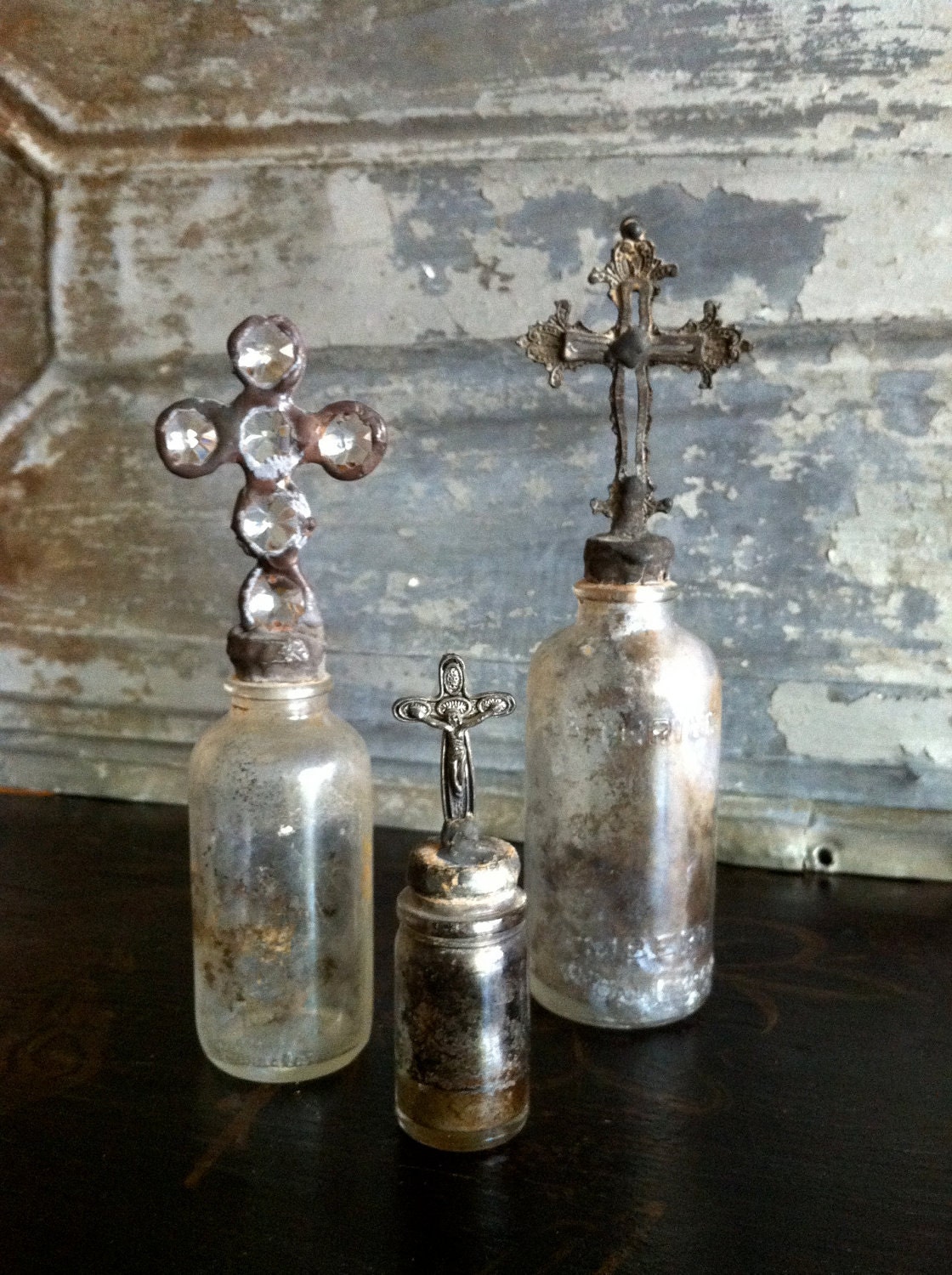 Set of 3 vintage bottles with crosses