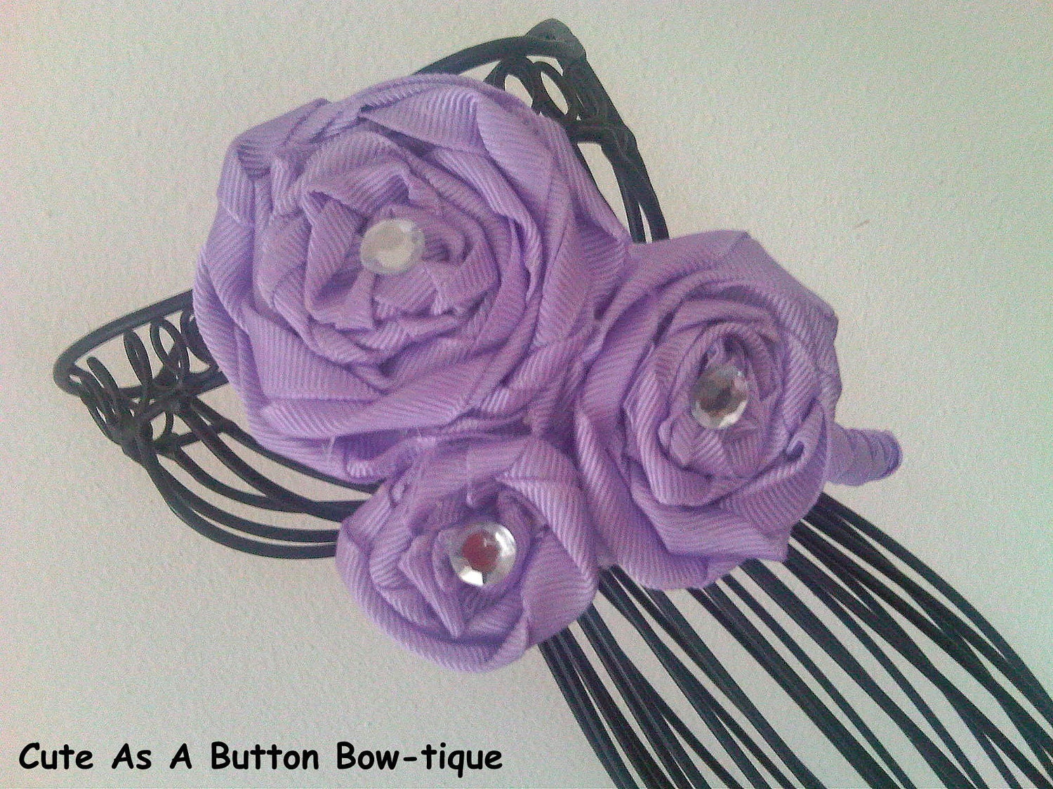 Woven Headband with Rosette Cluster