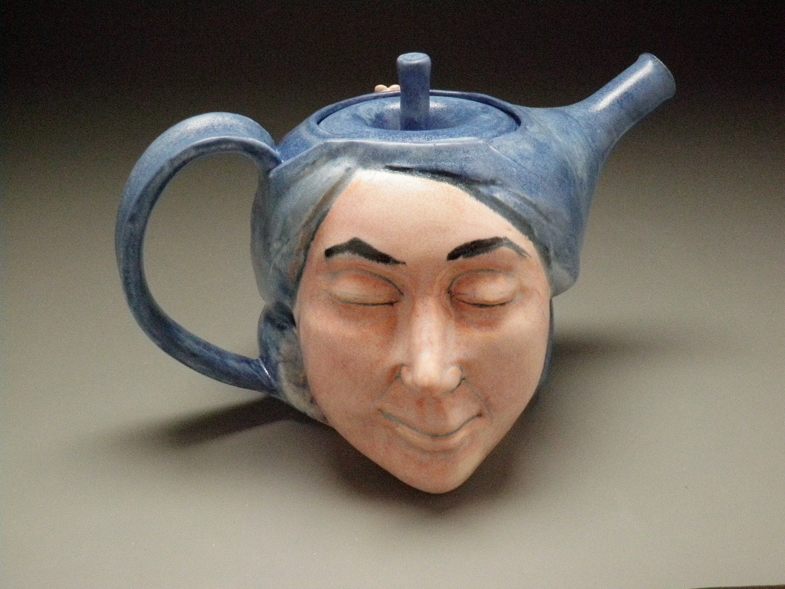ceramic face sculpture