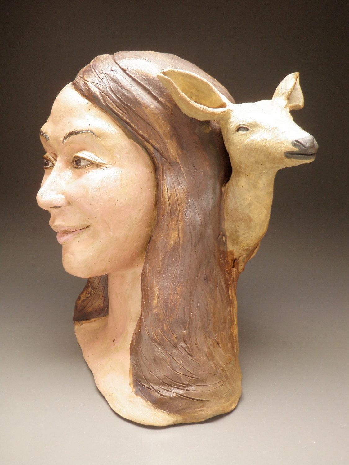ceramic face sculpture