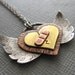 Healing Heart Takes Wing Mixed Metal Necklace Sterling Silver Copper Brass