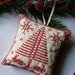 Cross Stitched Folk Art Ornament - rabbits