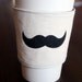 Moustache cup cozy