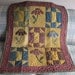 Appliqued Flowers Lap Quilt
